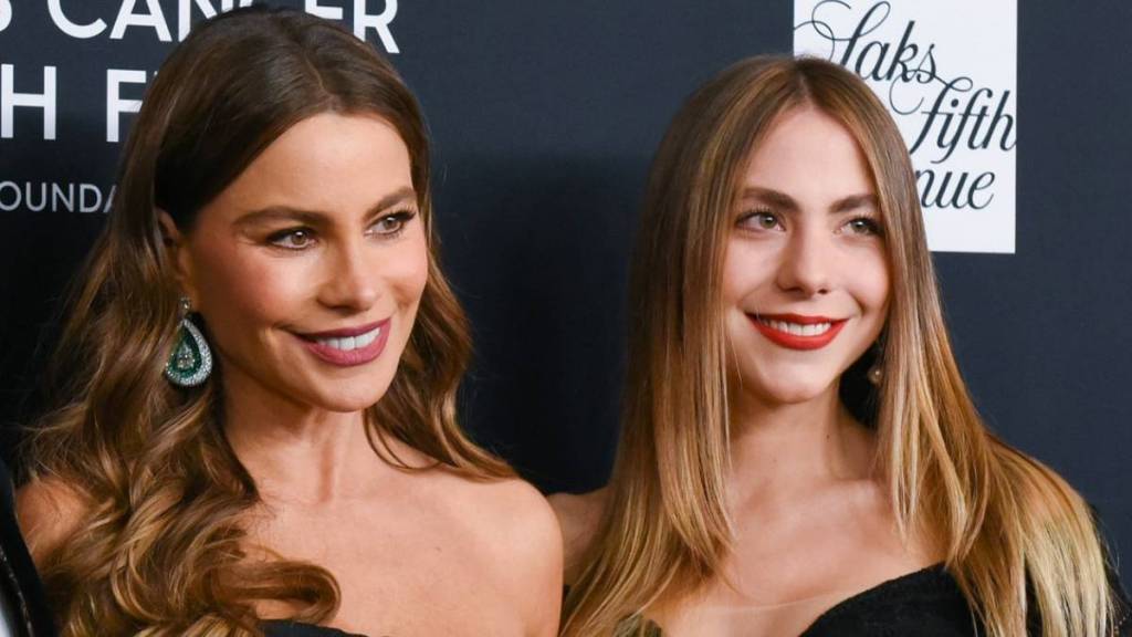 Sofia Vergara Dances With 'Mini Me' in Black Dress With Daring Neckline