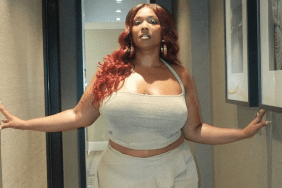 Lizzo wearing gold revealing two-piece set in heels photos