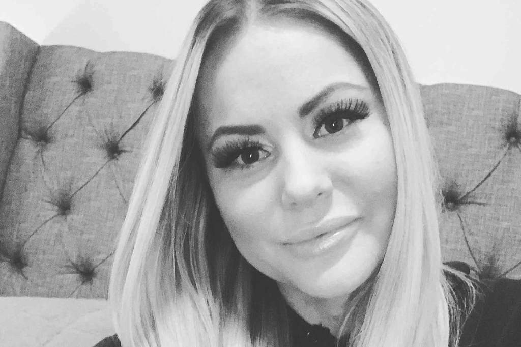 A black and white photo of Kelsey Bateman