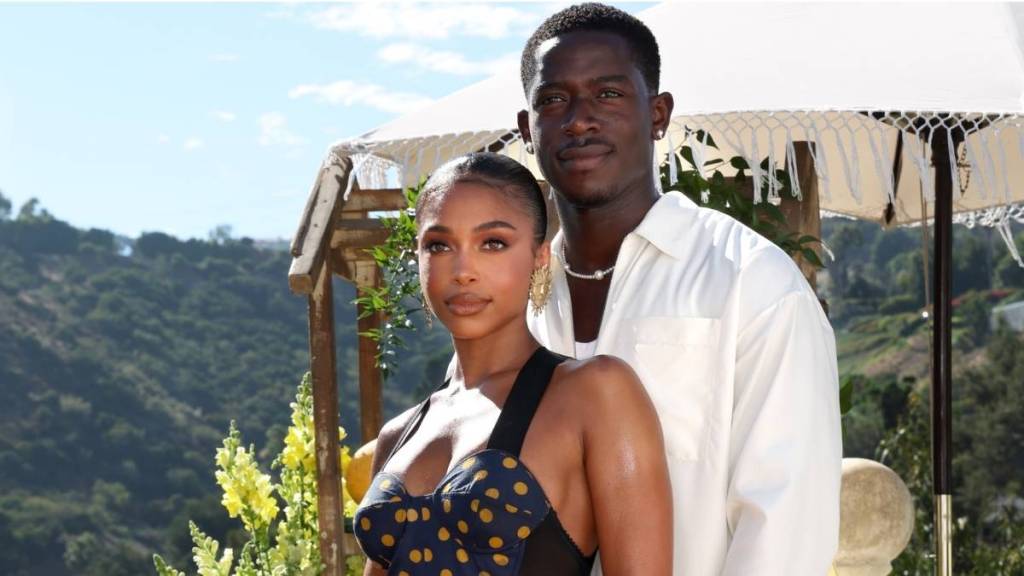 Lori Harvey Stuns in White Tank Top & Mini Skirt After Damson Idris Vacation