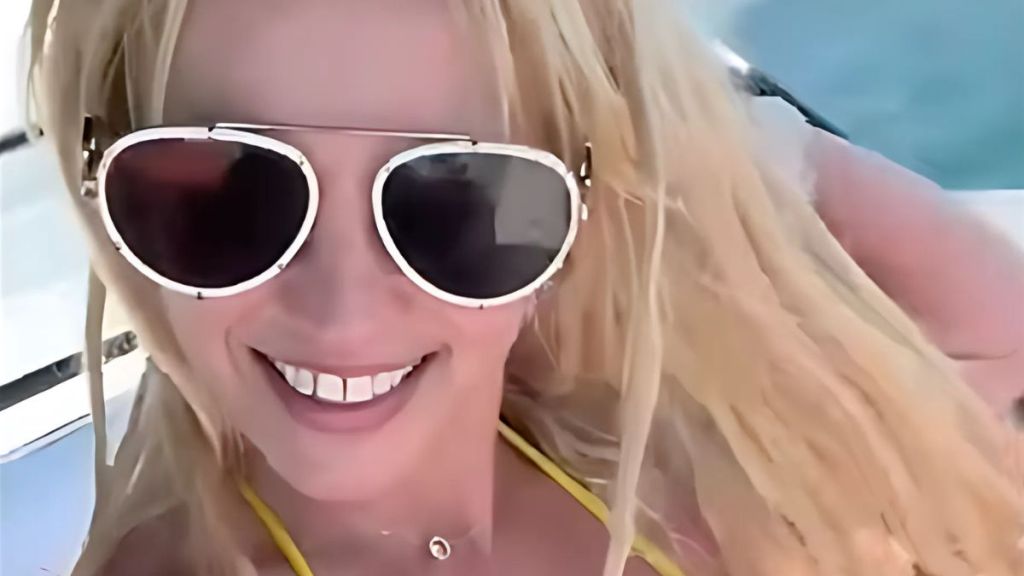 Britney Spears Shows Off Moves in Loose White Dress on a Yacht