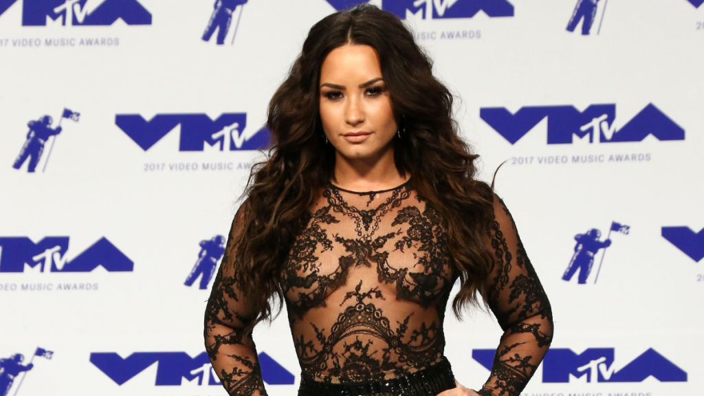 Demi Lovato nude illusion dress photo