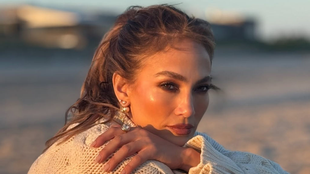 Jennifer Lopez Stuns in Knit Sweater & Mini-Skirt As Beachwear