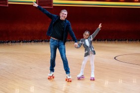 Todd Chrisley and Chloe Chrisley on roller skates