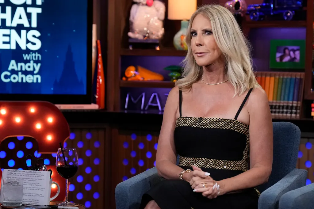 Vicki Gunvalson in a black and gold dress, giving a side eye on Watch What Happens Live