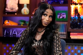 Tiffany Pollard in a black and gold dress on Watch What Happens Live giving a side eye
