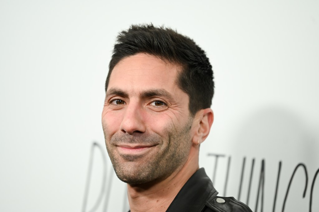 Nev Schulman in a black leather jacket at the premiere of Poor Things