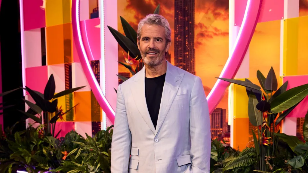 Andy Cohen in a grey suit at the Love Island USA reunion