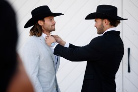 Jesse McBee on his wedding day getting his tie straightened by Steven McBee Jr