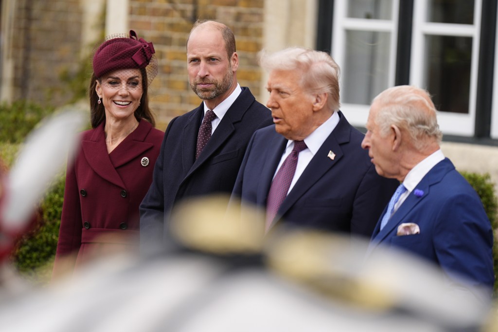 Kate Middleton, Prince William, and King Charles with a guest 
