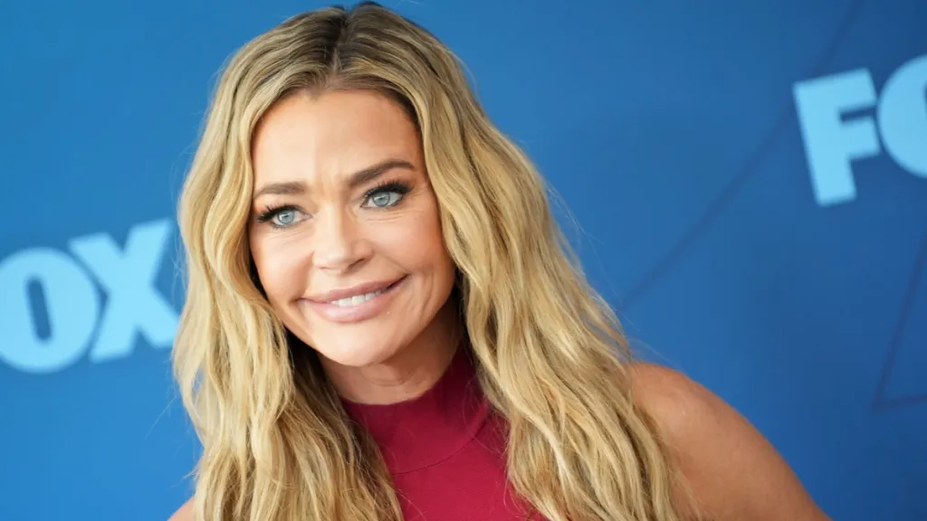 Denise Richards Stuns in Low-Cut Blouse for Drop Dead Gorgeous Screening