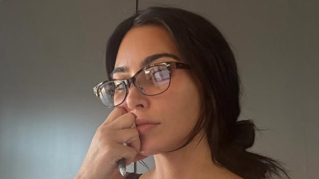 Kim Kardashian Wears Nothing Beneath See-Through Tank Top & Leggings