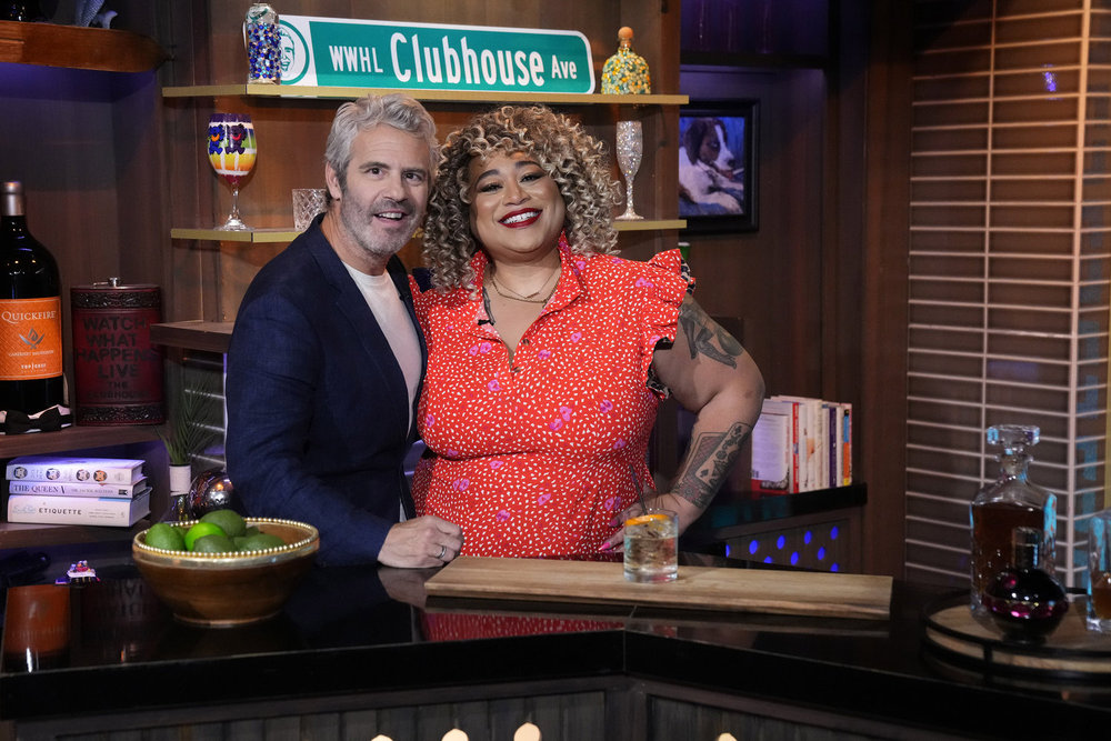 Kiki Monique and Andy Cohen behind the bar at Watch What Happens Live 