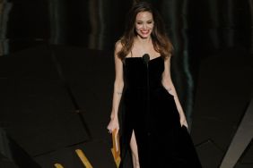 Angelina Jolie Stuns in Thigh-High Slit Coat As She Recreates Iconic Pose
