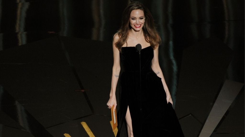 Angelina Jolie Stuns in Thigh-High Slit Coat As She Recreates Iconic Pose
