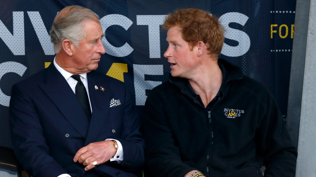 Prince Charles, Prince of Wales & Prince Harry watch the athletics during the Invictus Games at the Lee Valley Athletics Centre on September 11, 2014 in London, England.