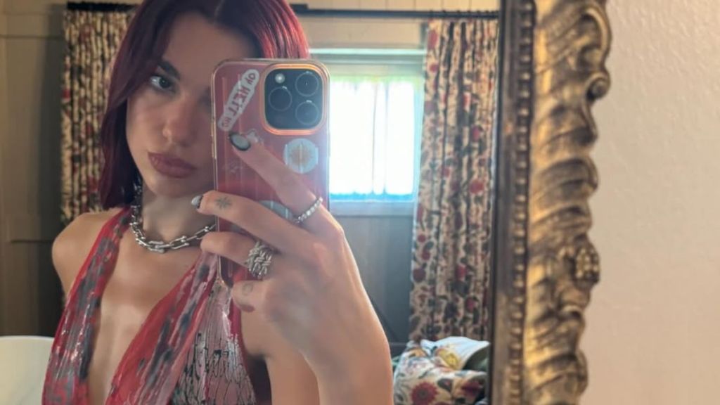 Dua Lipa Gives Gold Bodysuit a BDSM Spin in New Photos