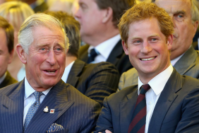 Prince Charles, Prince of Wales and Prince Harry laugh during the Invictus Games Opening Ceremony on September 10, 2014 in London, England. The International sports event for 'wounded warriors', presented by Jaguar Land Rover, is just days away with limited last-minute tickets available at www.invictusgames.org