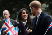 Prince Harry and Meghan Markle meet local school children during a visit to Birmingham on March 8, 2018 in Birmingham, England.
