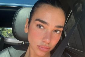 Dua Lipa Poses in White Backless Dress & Fans Can't Get Enough