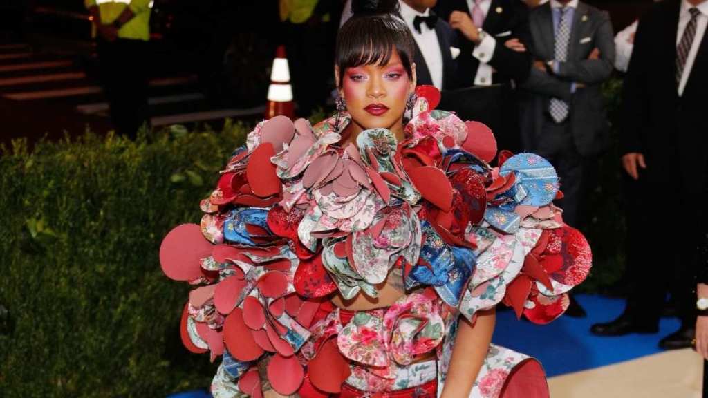 Rihanna Decks Herself in Just Flowers While Posing in a Bathtub in Fenty Skin Photos
