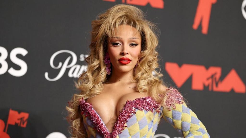 Doja Cat Wears Jaw-Dropping Revealing Neckline Mini-Dress
