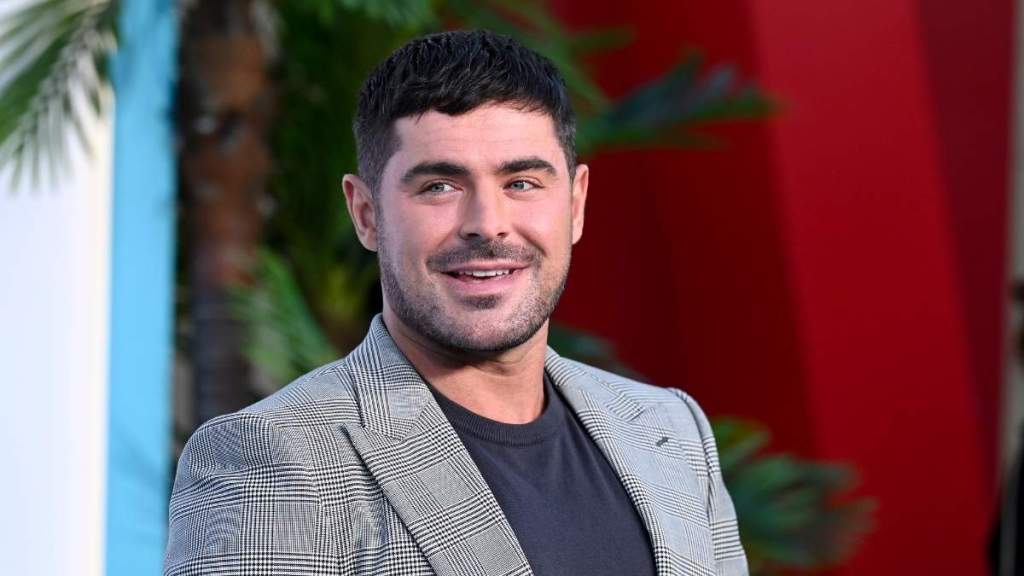 Zac Efron Debuts New Blond Makeover Amid Nina Dobrev Vacation