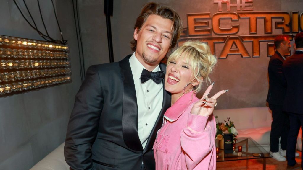Jake Bongiovi and Millie Bobby Brown attend the World Premiere of Netflix's "The Electric State" at Citizen News on February 24, 2025 in Los Angeles, California