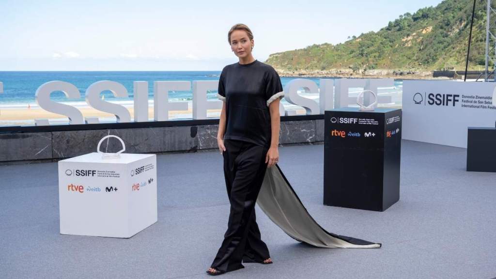 Fans React to Jennifer Lawrence's Dramatic Cape With Wide Trouser Look
