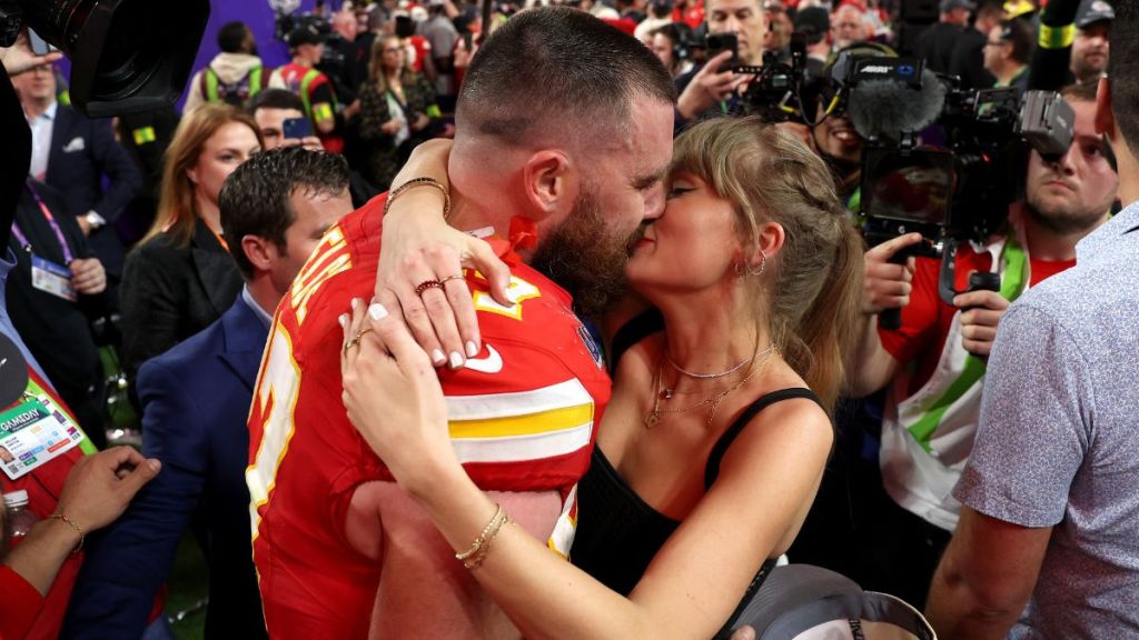 Travis Kelce #87 of the Kansas City Chiefs and Taylor Swift embrace after defeating the San Francisco 49ers in overtime during Super Bowl LVIII at Allegiant Stadium on February 11, 2024 in Las Vegas, Nevada.