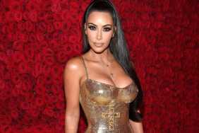 Kim Kardashian Is ‘Serving’ in Metallic Gold Corset Look