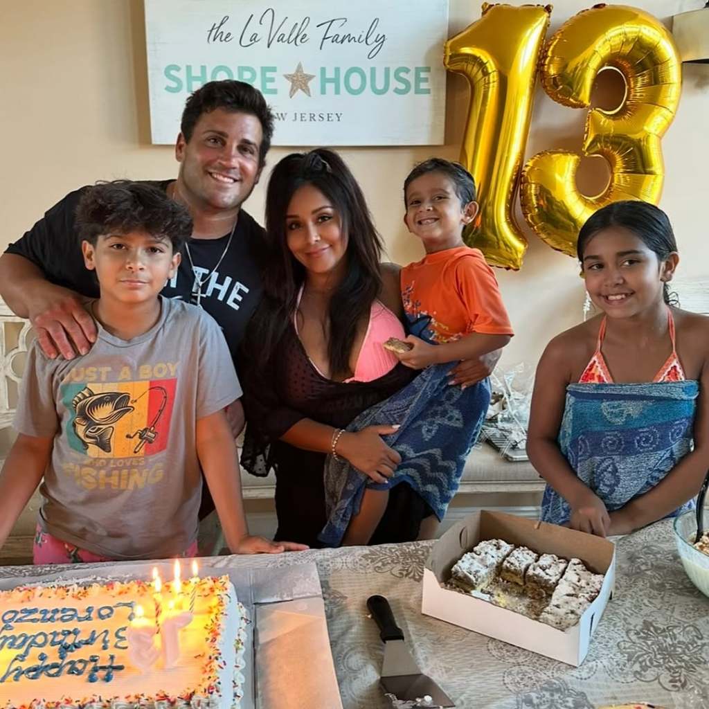 Nicole "Snooki" Polizzi with her husband and three kids, celebrating a 13th birthday