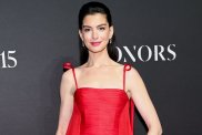 Anne Hathaway Dazzles in Red Gown at WWD Honors