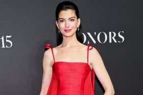 Anne Hathaway Dazzles in Red Gown at WWD Honors