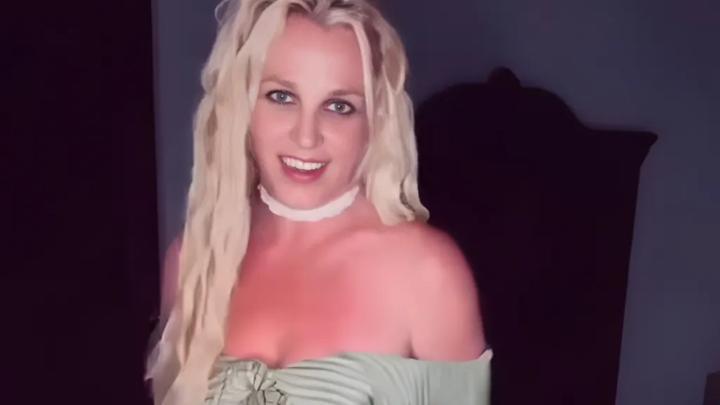 Britney Spears Dances in Loose Strap Dress