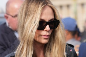 Charlize Theron Walks Past Johnny Depp at Dior Event