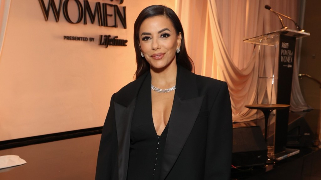 Eva Longoria Turns Heads in Daring Neckline Mini-Dress