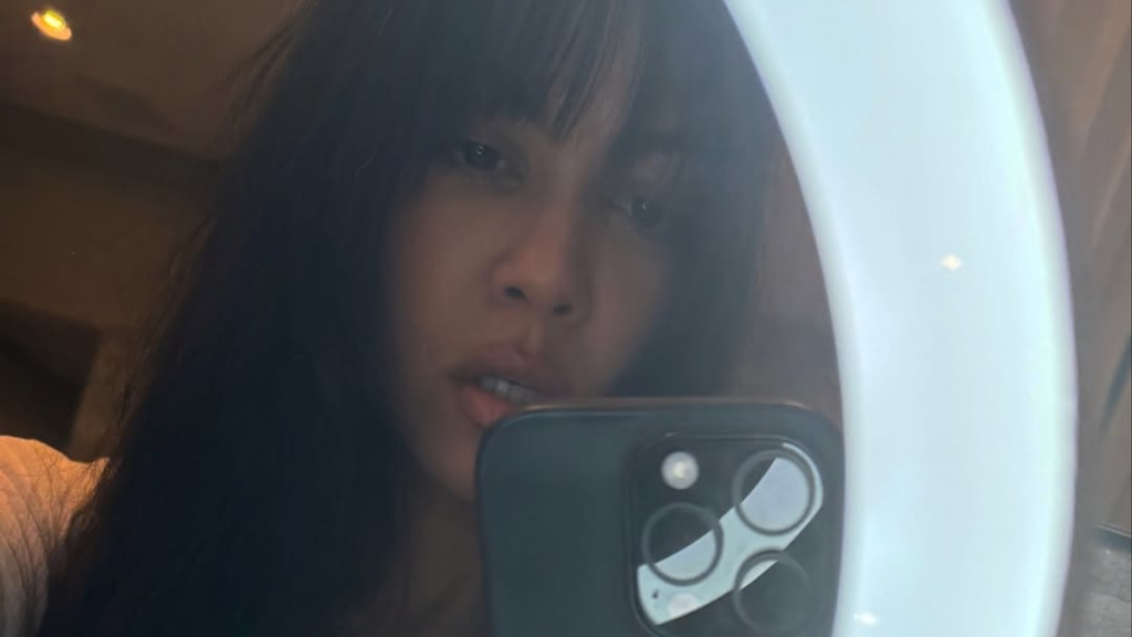 Kourtney Kardashian Shows Off Her New Haircut in Mini-Dress