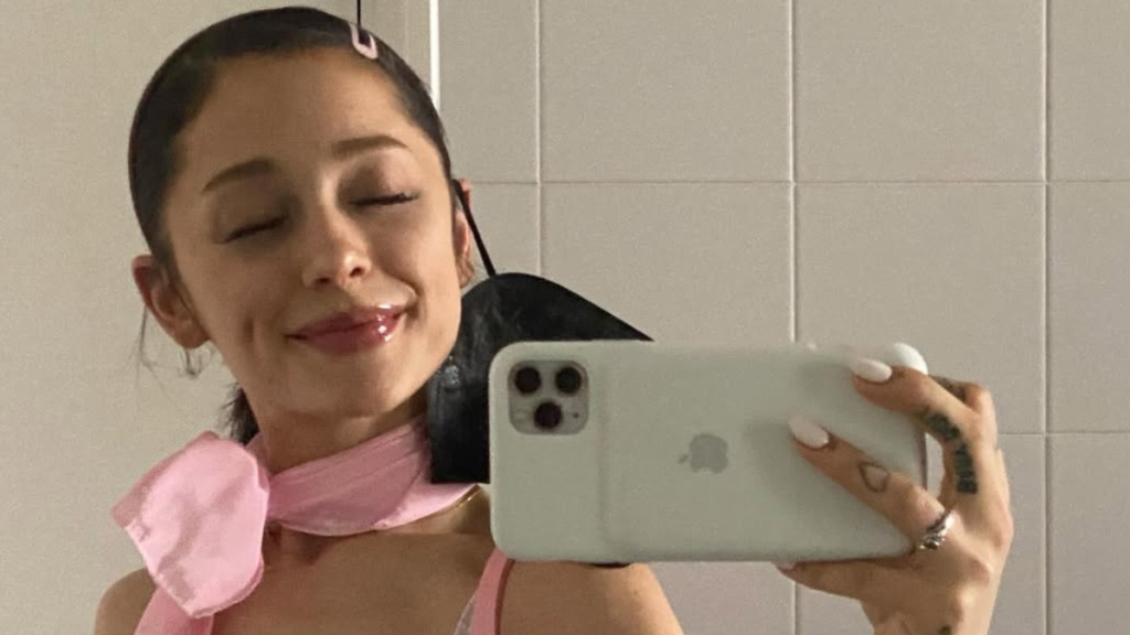 Ariana Grande’s ‘Wicked’ Set Photos Feature ‘Too Many Wonderful Things’
