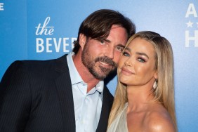 Aaron Phypers and Denise Richards posing cheek to cheek