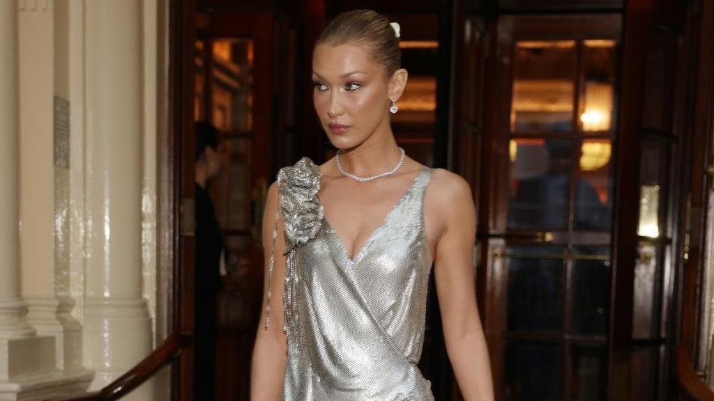 Bella Hadid Has the ‘Most Precious Smile’ Wearing Slinky Ruffle Dress in London Photos