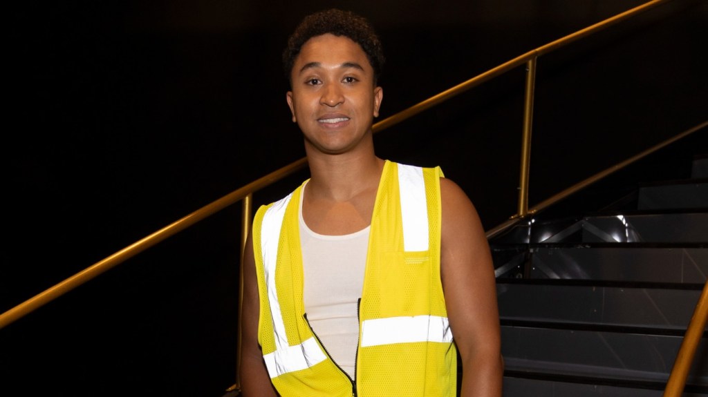 Brandon Armstrong in a yellow high-visibility vest