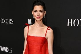 Anne Hathaway Sets Fire to 2025 WWD Honors Carpet in Red Gown