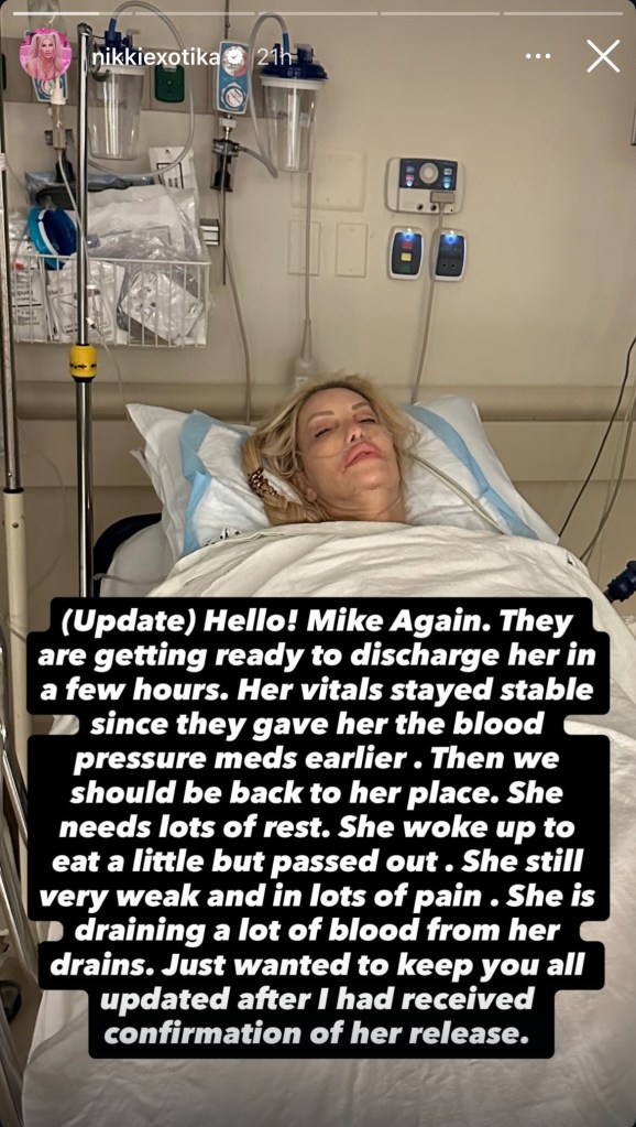 Nikki Exotika laying in hospital bed 