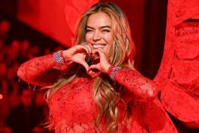 Karol G Is ‘Serving That Latina Vibe' in Red Lace Catsuit, Fans Say