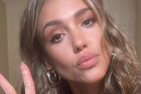 Jessica Alba Pouts As She Poses in Bold Neckline Dress