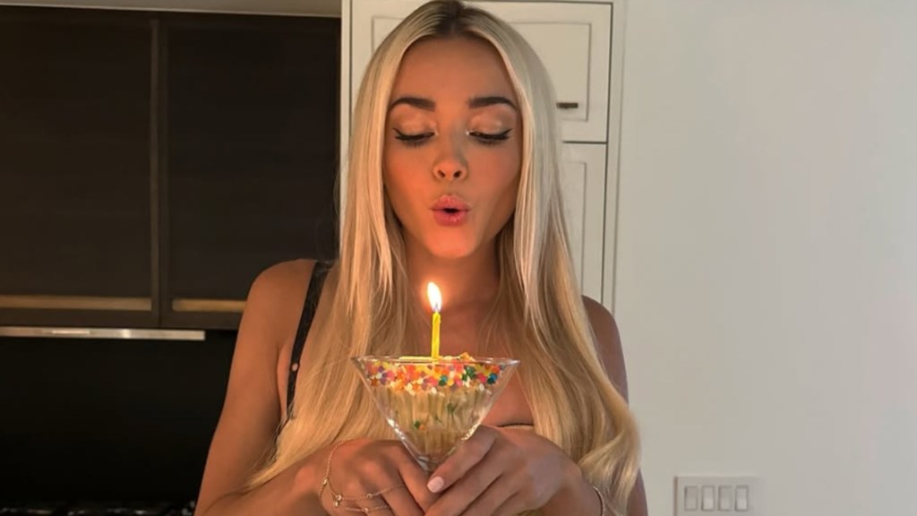 Livvy Dunne Turns Heads in Gold Mini Skirt