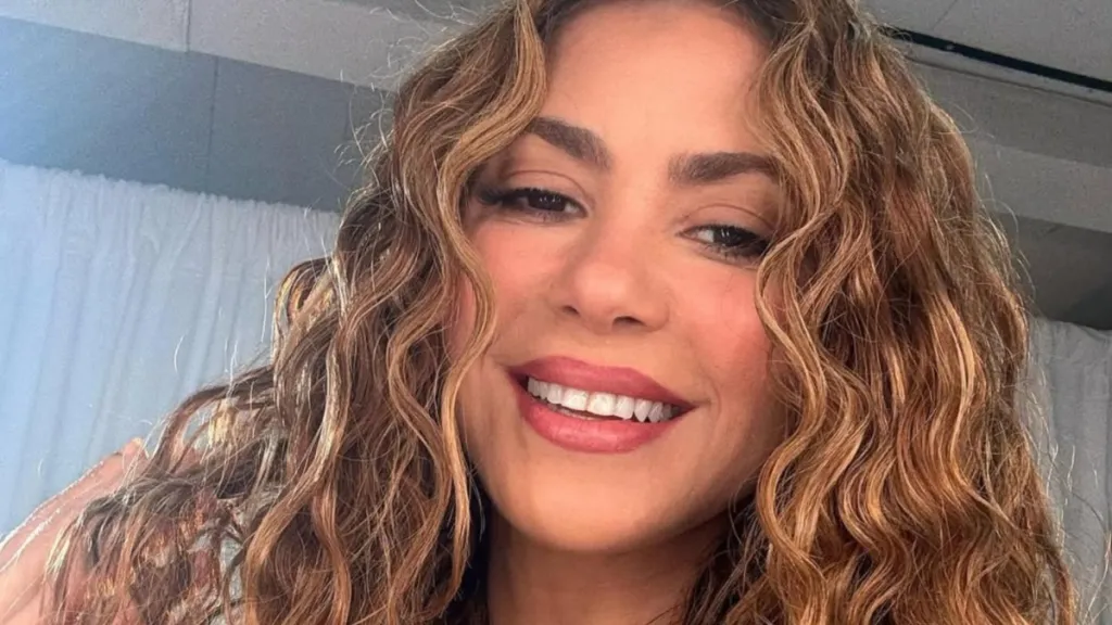 Shakira Turns Heads in Satin Slip Look on Bed