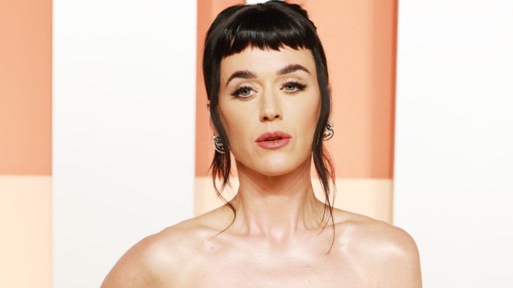 Katy Perry Wows Fans in Red Backless Dress