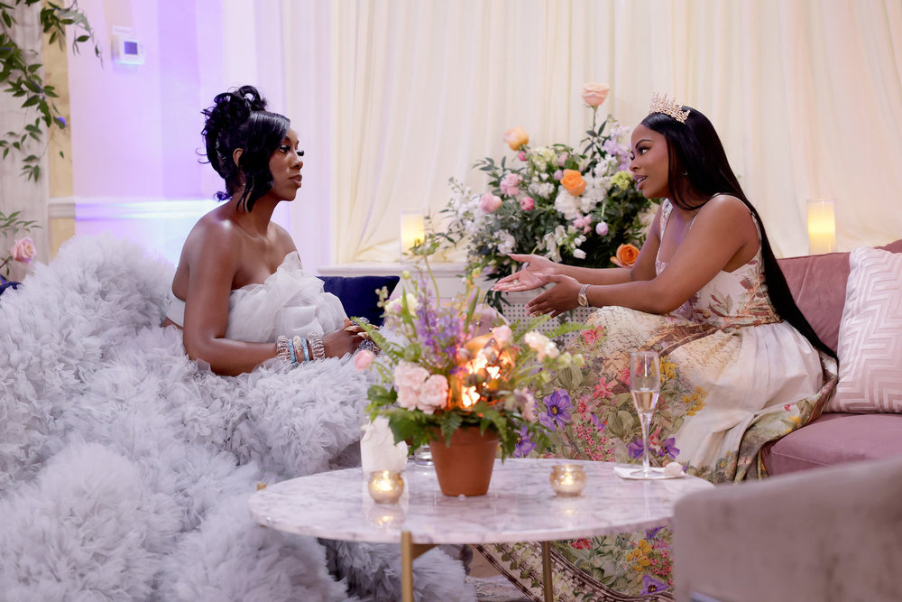 Wendy Osefo and Kierana Stewart sitting across from each other at the Second Bloom Ball